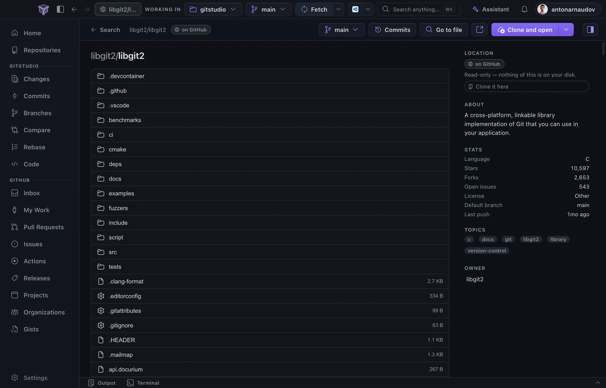 GitStudio Desktop reading libgit2/libgit2 straight from GitHub: the file tree, a rail saying the repository is on GitHub and nothing is on your disk, a Clone and open button, and a top bar that still names the repository you are working in